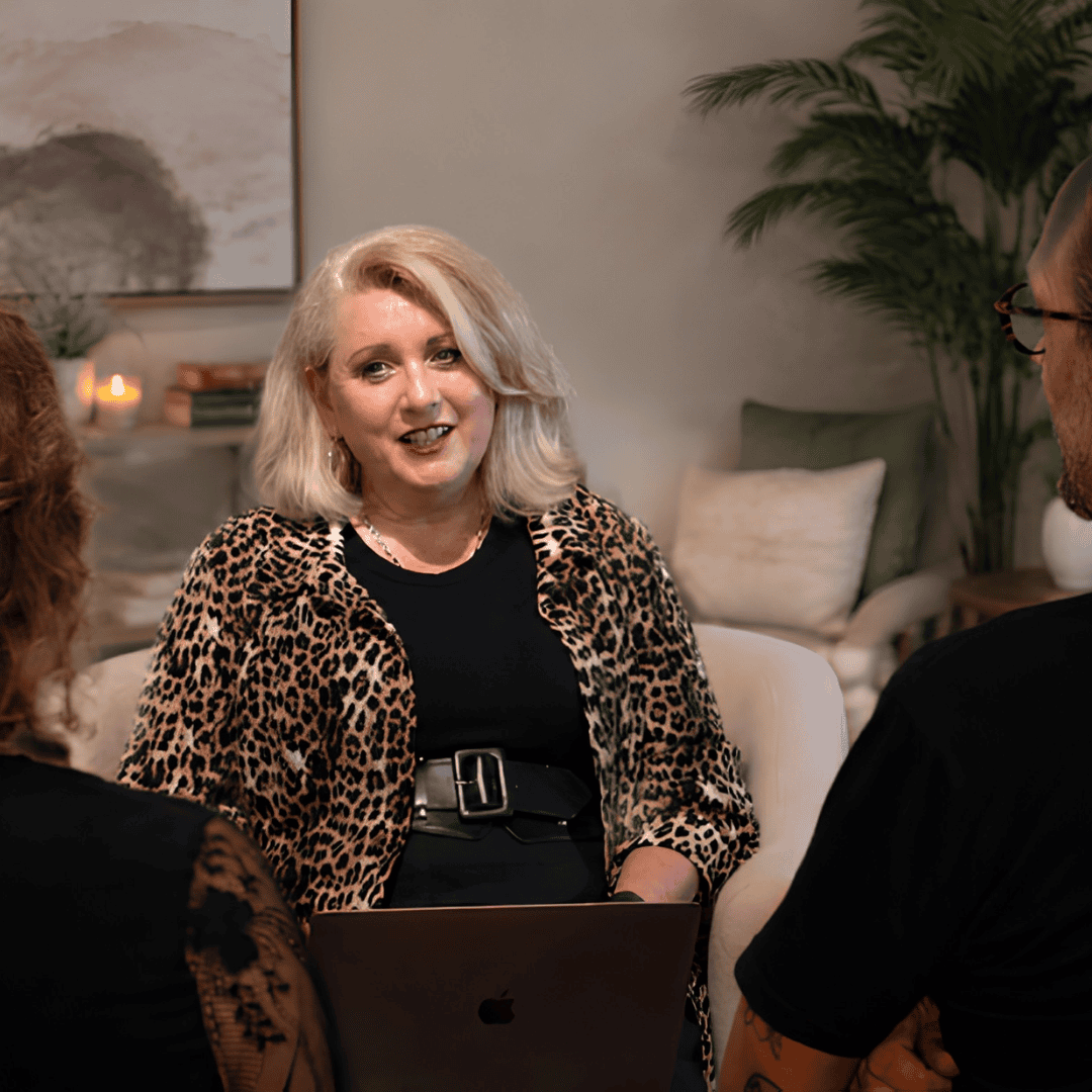 Megan Tregilgas speaking with clients during a counselling session